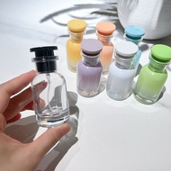 High quality colored glass perfume bottle 30ml L-V spray form.