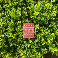 Vertical brocade crossbody bag shaped like 3 lucky coins