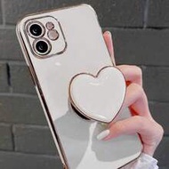 ขาตั้งรูปหัวใจชุบทองและเคสโทรศัพท์ชุบทอง, เข้ากันได้กับ IPhone 17/16e/15/14/13/12/11/XS/XR/X/7/8 Plu