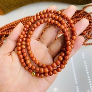 Bracelet of 108 red blood jade beads C. Thach 6 mm wrapped in 4 times