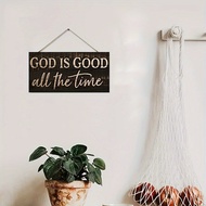 A decorative wall art piece that says "God is always good," a decorative wooden home office/home dec