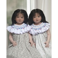 Smocked Bishop