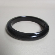 กำไลหยกพม่า Jadeite type A ขนาดวงใน 62mm กว้าง 11.7mm สีดำสวยงามสวมใส่ได้ทุกเพศ