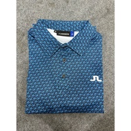 Charcoal green polo golf shirt with stretchy, absorbent striped pattern