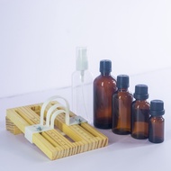 Manual decal application tool for round bottles 10ml to 1L