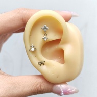 Titanium G23 earrings with dangling bow