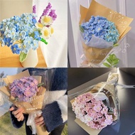 Bouquet of multi-colored hand-crocheted wool forget-me-nots