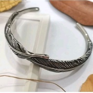 Stainless Steel Takahashi Goros Feathers Bangle Bracelet.