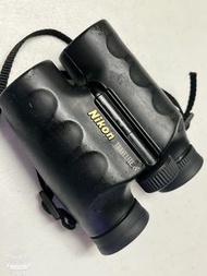 (表面沾黏請自行去除）二手Nikon travelite望遠鏡（9*25 ，5.6）鏡頭難免有霉斑！還能用！在意者別買