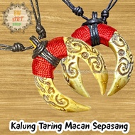 A PAIR OF TIGER TARING NECKLACES | Tiger TARING