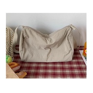 UNIQLO U บ้านลองกระเป๋าสะพายไนลอนเดียวกันกระเป๋าสะพายความจุขนาดใหญ่