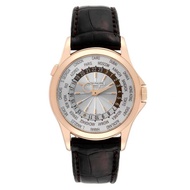 Patek Philippe Patek Philippe World Time (Reference 5130R-001). A rose gold automatic wristwatch.