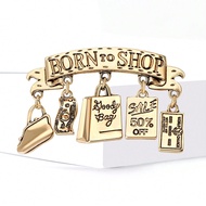 เข็มกลัดชิ้นเดียว "Born To Shop" สำหรับผู้หญิง - เข็มกลัดถุงเงินตัวอักษรน่ารัก สำหรับใส่กับเสื้อ แจ็