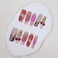 10 ชิ้น เล็บยาวทำด้วยมือ สไตล์ฝรั่งเศสสีชมพู Y2K & ดอกไม้ 3 มิติ ทำด้วยมือ & ทับทิมและดอกซากุระบนลาย