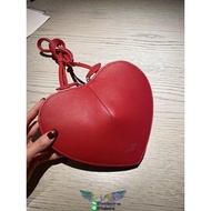 Alaia women's heart-shaped coin pouch sling crossbody bag