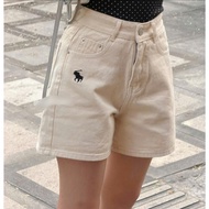 Beige jeans with horse embroidery
