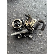 TRITON KB4 4D56U TURBO OIL FILTER HOUSING USED