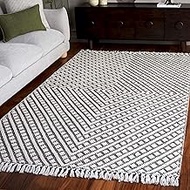 Safavieh Natura Collection NAT357A Handmade Moroccan Boho Fringe Wool Area Rug, 5' x 8', Ivory / Bla