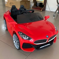 Ô tô xe điện trẻ em BMW Z4 tự lái và remote 2 động cơ bảo hành 6 tháng (Đỏ-Cam-Trắng)