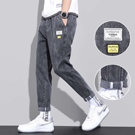 2021 spring summer new men's jeans teen loose bundle foot tools casual long pants Korean version of the tide