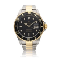 Rolex Submariner Reference 116613, a yellow gold and stainless steel automatic wristwatch with date,