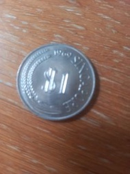 這是一枚 1969 年發行的新加坡 1 元硬幣。
