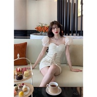 Stylized beige dress