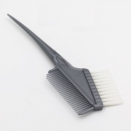 2-headed dye brush used to apply professional hair dye