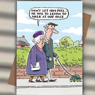 Funny Cartoon Birthday Greeting Card With "DON'T LET HIM PULL HE HAS TO LEARN TO WALK AT OUR PACE" T
