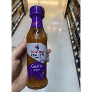 ซอสหมักไก่ย่าง และจิ้มอาหาร รสกระเทียม ตรา นานโด้ส์ 125 G. Garlic Peri - Peri Sauce ( Nando’s Brand 