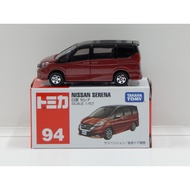 Tomica No. 94 Nissan Serena diecast car.