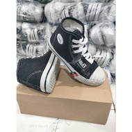 Black and white nb school boots