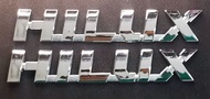 logo HILUX ติดข้างรถ ซ้าย - ขวา 2 ชิ้น HILUX REVO รีโว้ โตโยต้า Size: 3.8*22 CM รับประกัน 6 เดือน ไม