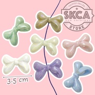 CZY2 Mote Ribbon Bowtie Pastel AB Hole