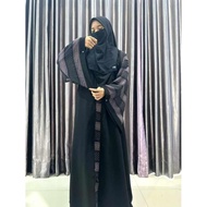 Malika's abaya