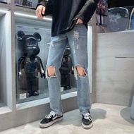 ◄ 👖 กางเกงยีนส์ ทรงสลิม ขาด ผู้ชาย แฟชั่นวินเทจ สไตล์เกาหลี กางเกงยีนขาเดฟ ขายาว ชาย สีน้ำเงิน Jeans