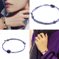 BTS V wearing CCNMADE Gemstone Trinity Thread Bracelet