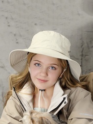 無性別兒童漁夫帽，嬰兒遮陽帽使用快幹材料製成。春夏風格的遮陽帽適用於西部牛仔帽、登山帽、徒步旅行帽和野營帽等戶外活動。它有一個捲邊帶按鈕和拉繩，可調節頭圍和可摺疊設計。寬邊帽提供防曬功能，並配有防風繩。隨機米色。