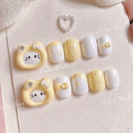 Hello Kitty candy cream yellow fake nails with bow charms and cute polka dots light yellow hello Kit
