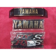 RXS115 Logo Emblem Fork Side Cover Tank battery side cover logo