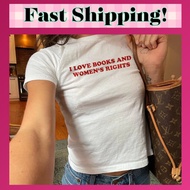 LOVE BOOKS AND WOMEN'S RIGHT Women's Crop Top l y2kbaby BabyTee