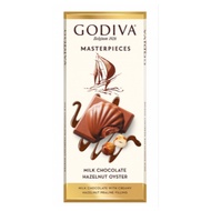 GODIVA MASTERPIECE MILK CHOCOLATE CARAMEL LION OF BELGIUM/HAZELNUT OYSTER/DARK CHOCOLATE GANACHE HEA