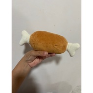 Squeaky stuffed chicken drumstick toy