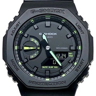 卡西歐 G-SHOCK GA-2100-1A3 霓虹點綴系列八角形腕錶，橡木色錶殼，黑色/綠色指針/數位雙顯，雙 LED 背光，2022 年 2 月發售，Mikunigaoka 專賣店販售。