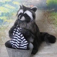 Raccoon realistic toy. Stuffed animals. Poseable art doll