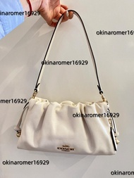 COACH蔻馳Faye雲朵包奶白色