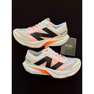New Balance New Balance FuelCell Rebel V4 “White with Angora and Hot