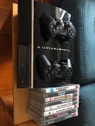 PlayStation 3 with 2 Controllers and 8 Games
