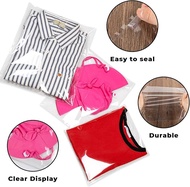 Plastik OPP Packing Baju Seal Lem Bening 100Pcs 35X39 - 30X37 - 28X35 - 25X35 - 22X27 - 21X27 -20X27