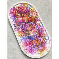 1 ounce package balloon rubber.